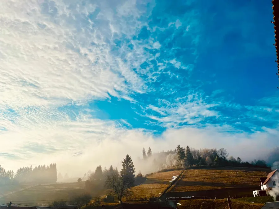 Dramatic morning mist over the hills around the house
